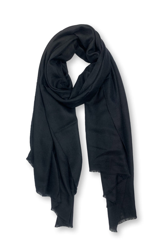 Featherweight Cashmere Shawl in Black available at Mildred Hoit in Palm Beach.
