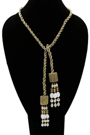 Boks and Baum Gabrielle Necklace in Champagne available at Mildred Hoit in Palm Beach.