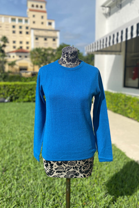 Diane Snyder Sloan Crew Neck Sweater in Teal available at Mildred Hoit. 