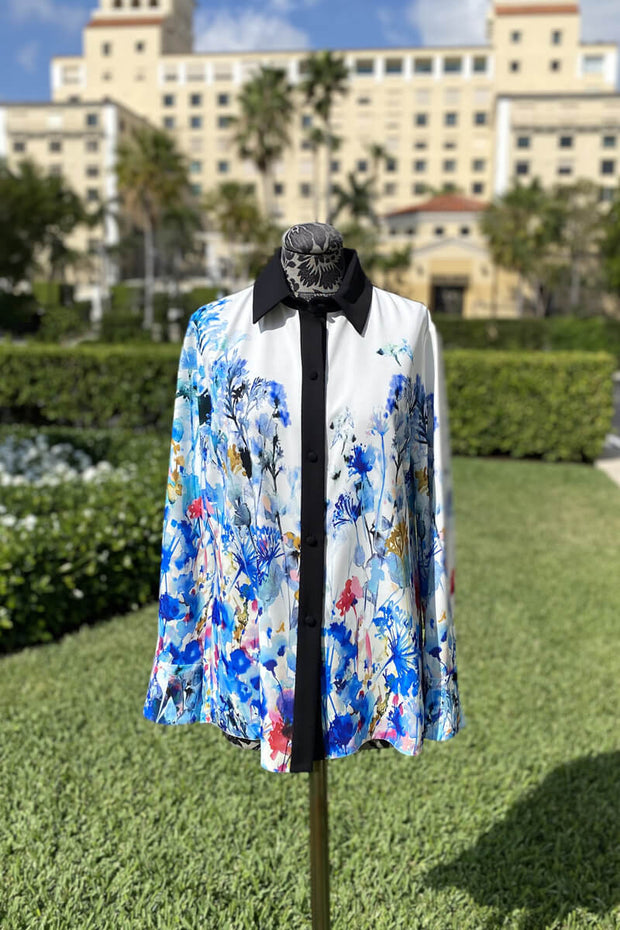 Emmelle Luxurious Crepe Floral Blouse with Black Trim available at Mildred Hoit in Palm Beach.