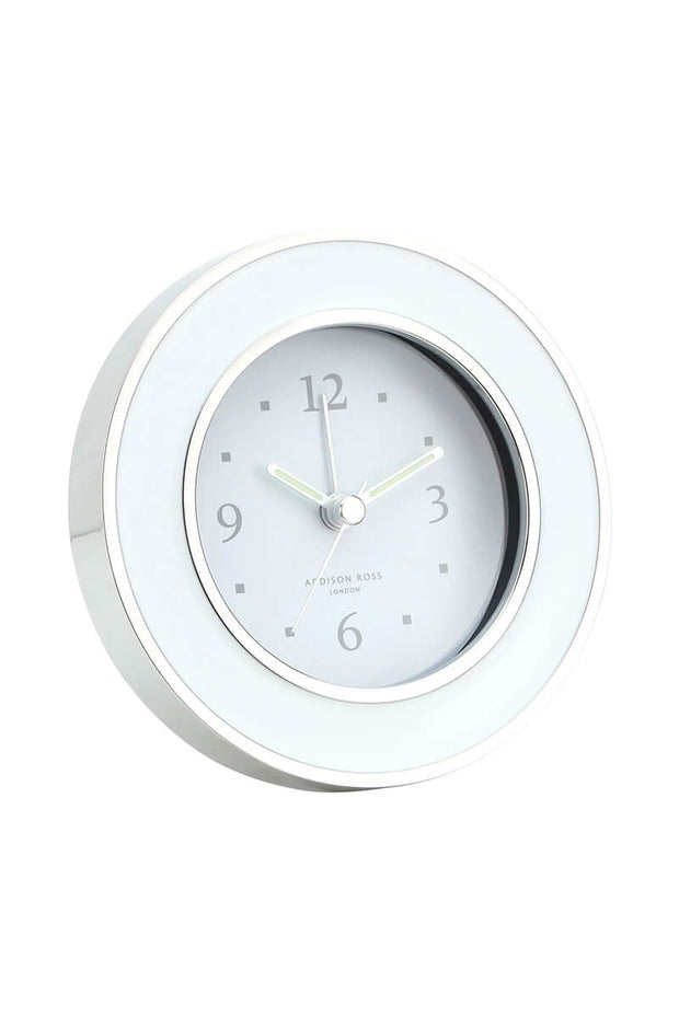White and Silver Silent Alarm Clock available at Mildred Hoit in Palm Beach.