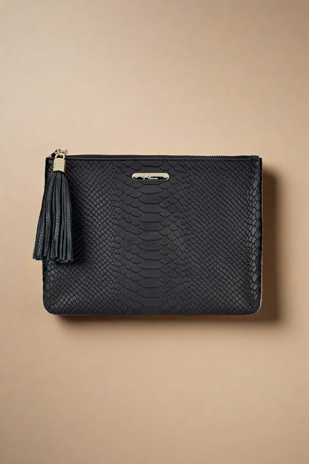 Black Leather Clutch Bag available at Mildred Hoit.
