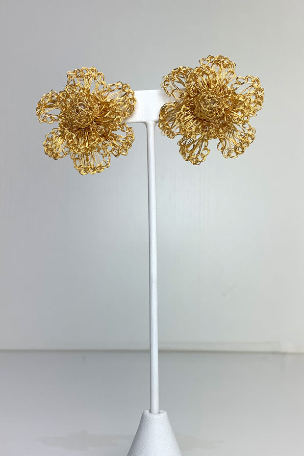 Gold Flower Earrings with Crocheted Center available at Mildred Hoit in Palm Beach.