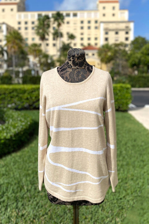 Beige Sweater with White Geometric Stripes available at Mildred Hoit.