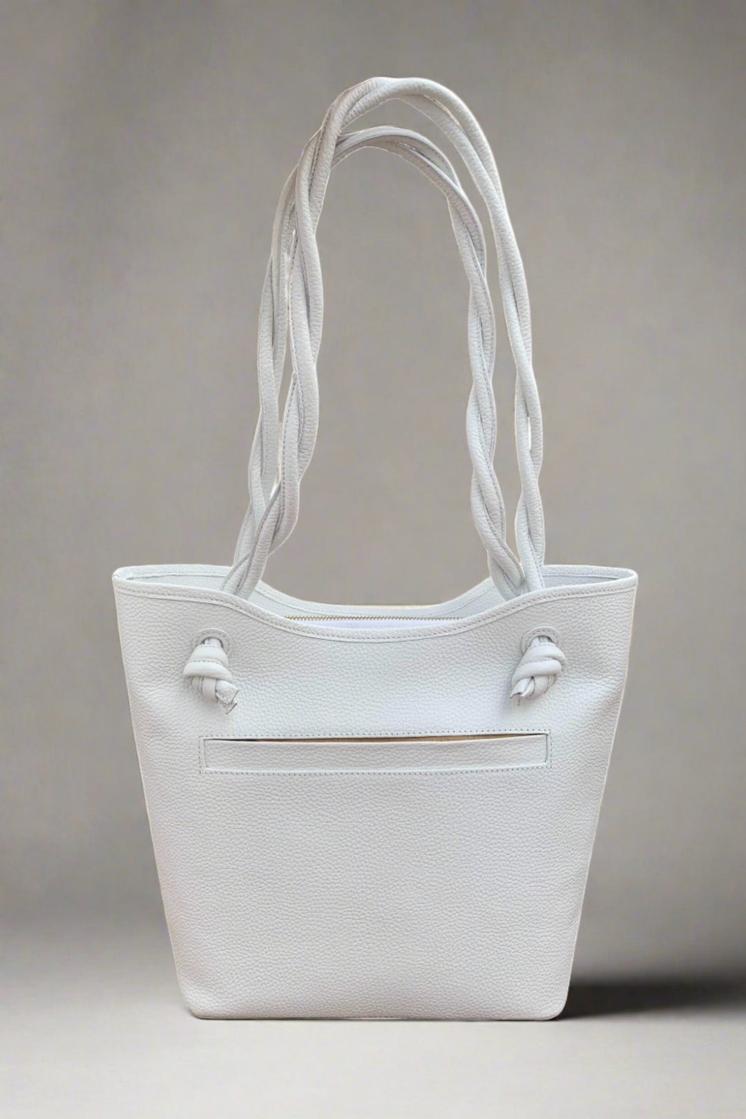 Medium White Leather Handbag available at Mildred Hoit in Palm Beach.