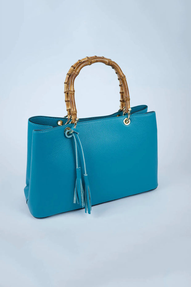 Leather Como Bag with Bamboo Handles in Turquoise available at Mildred Hoit in Palm Beach.